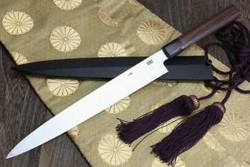 Japanese yanagi sushi knife with rosewood handle, dark saya, and purple cord tassels