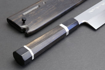Chef knife with mirror blade, dark ebony saya, silver-toned bolster accents
