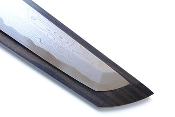 Japanese sushi knife with Damascus blade and dark handle, blade tip and bevel detail