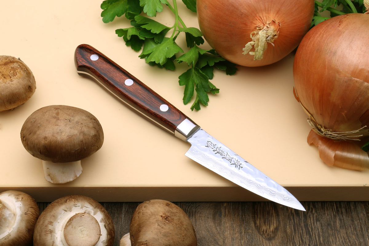 Damascus stainless steel nakiri and paring knives with hammered pattern, dark handles